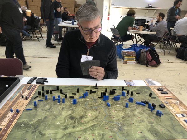 Jim M contemplates his hand